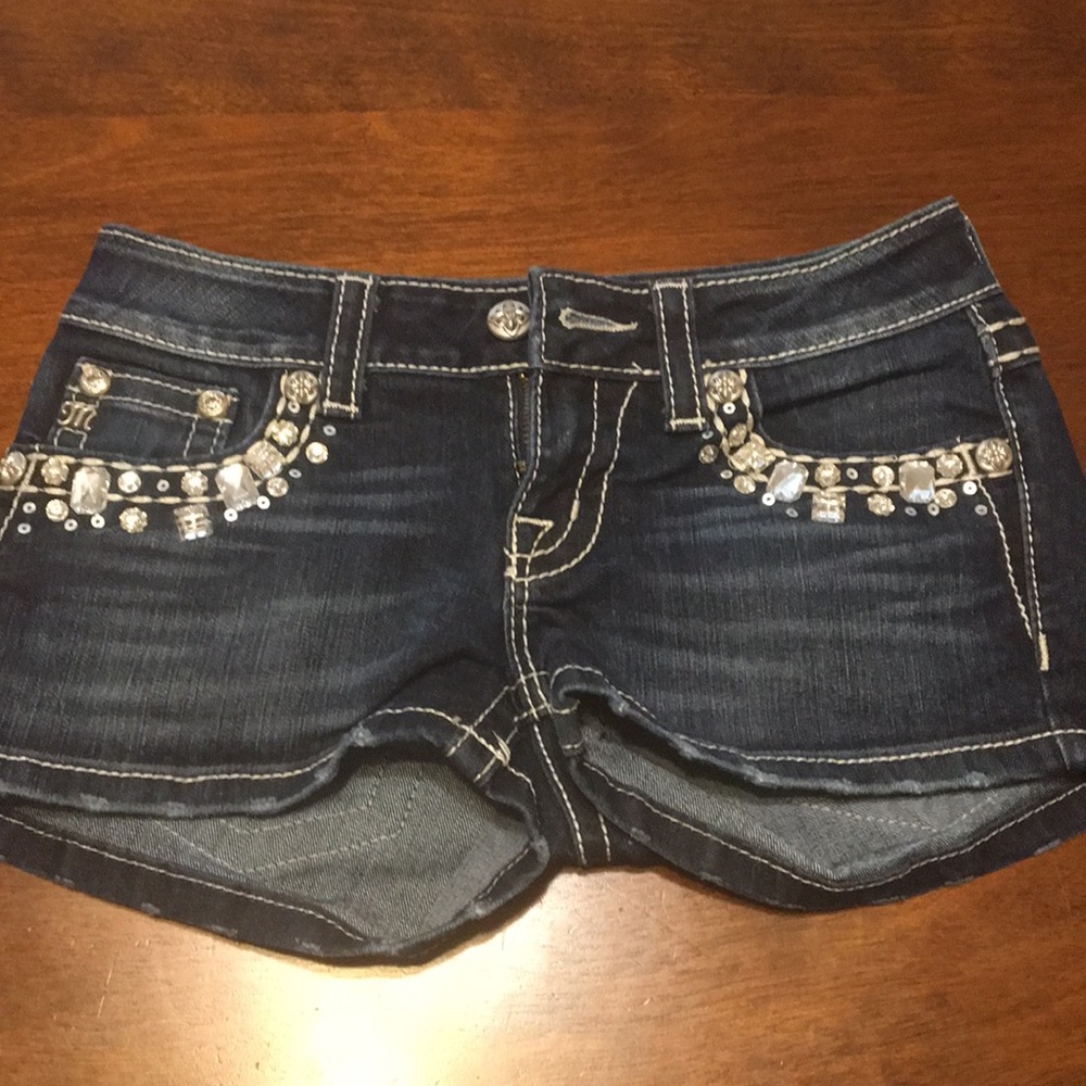 Size 25 Miss Me shorts! Worn a handful of times!